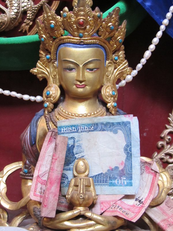 Buddha with money