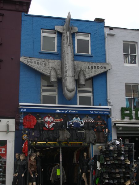 Plane mounted to shop front.