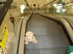 riding escalator