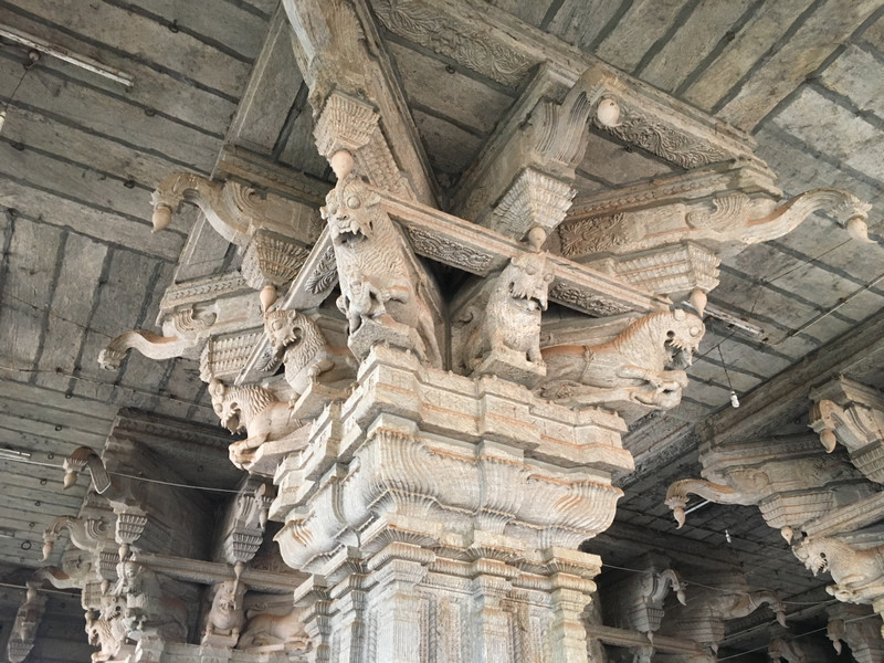 Carvings at top of massive pillar