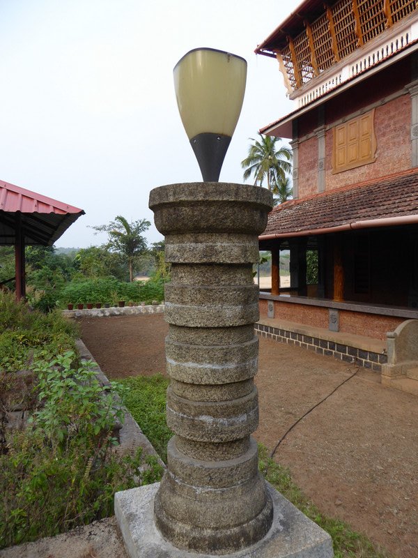 Recycled concrete pipe once used for transmitting sewage; sculpted and used for solar lamps.