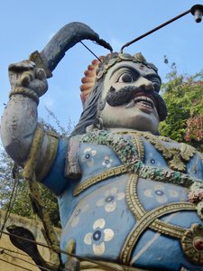 Karuppana raises his weapon, the auruval