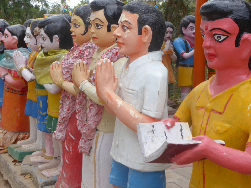 Hundreds of lifelike human statues suggest requests of the deity