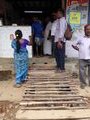 Ramp over the open sewage to the tea stall