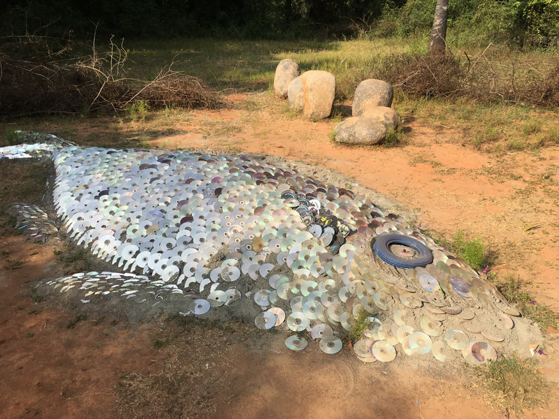 Discarded CD’s make a really cool ground sculpture