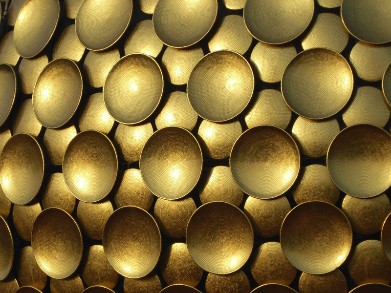 Gold covered glass on Matrimandir surface