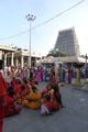 Women wearing Shakti energy red saris