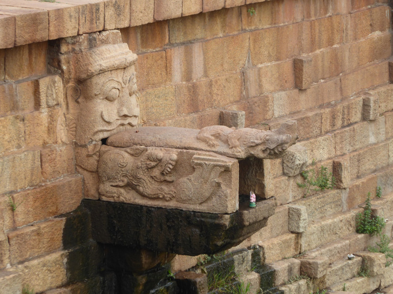 Carving on water spout