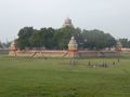 Central island with temple, cricket match