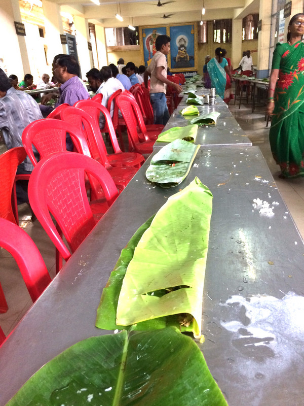 Banana leaves folded; diners are finished