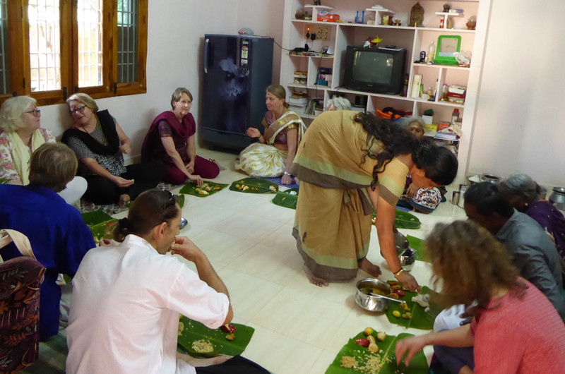 Guests eat the Rainbow Guest House Pongal Festival feast