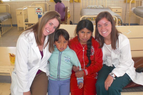 Sara and Erin with two of the patients