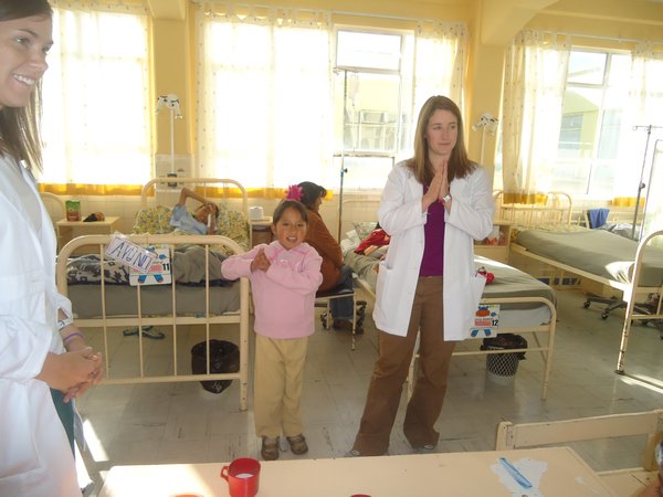 Erin and one of the patients doing the Waka Waka dance