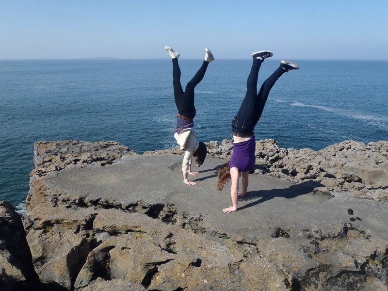 hand stand on the edge of a cliff? Why not. 