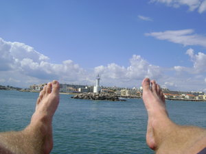 feet up at the sea