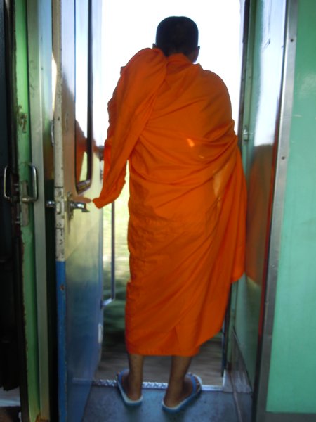 Monk on train