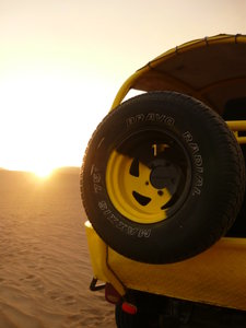 Sunset and dune buggy