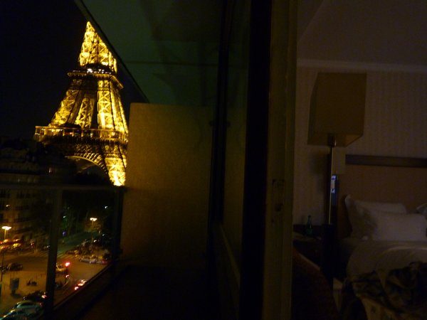147. The Eiffel Tower and our room. Taken standing in the balcony doorway