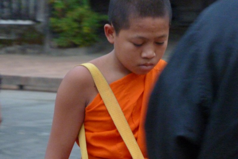 Young Monk at Tak Bat