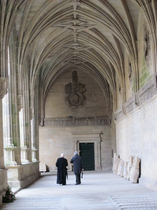 Clergy and Friend in Cloister