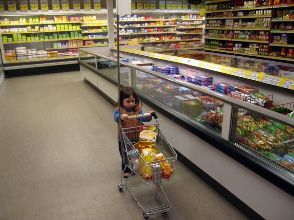 Liya helping with food shopping 