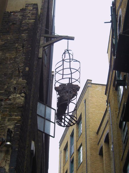 A gibbet suspended outside the Clink Prison Museum