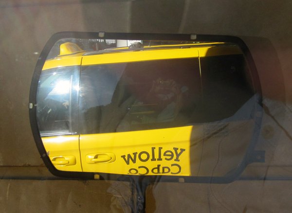 Reflection of a taxi