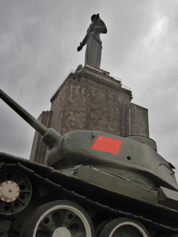 Mother Armenia Statue towers above a tank