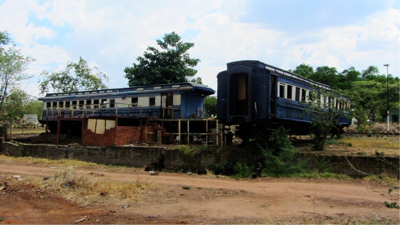 Abandoned railway carriages in the middle of town