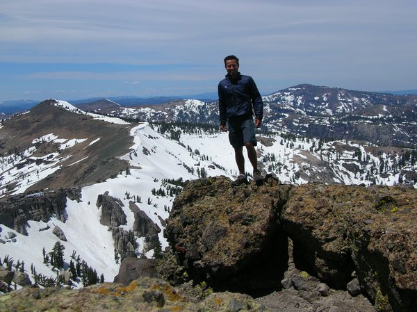 Me at the windy Castle Peak summit