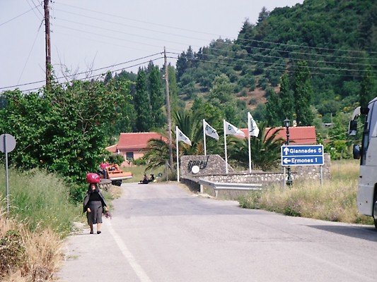 Villager crosses Ermones bridge