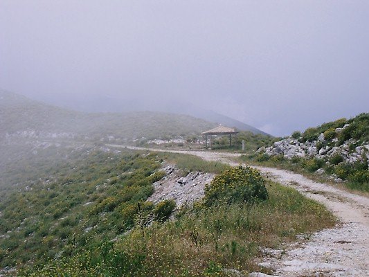 The High Col appears through teh cloud but you cannot see Pantokrator behind