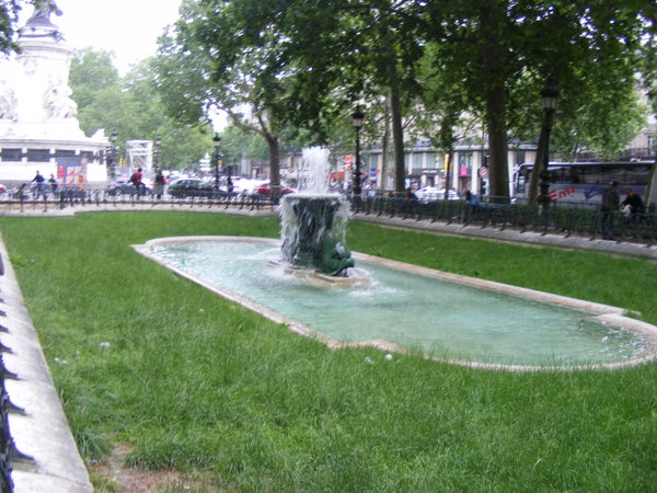 Square with fountain and campers