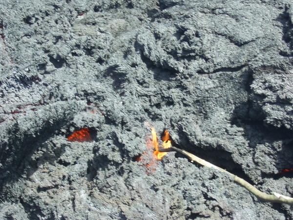 Steve pokes flowing lava on Mount Pacaya