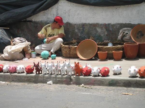 Man Selling Ceramic Crafts