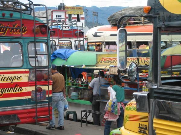 The Many Colorful Buses at the Xela "Bus Area"