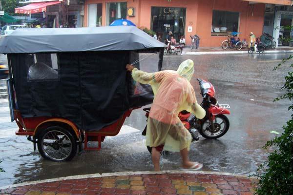 Washing off the tuktuk