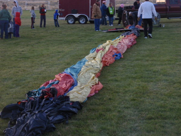 1st they lay out the balloon....