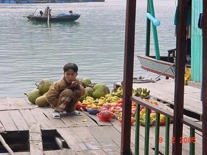 Boy with fruit at Halong Bay