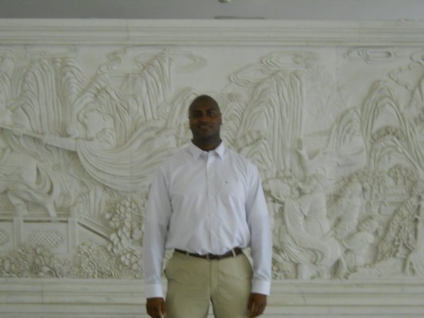 Me in front of a cool carving at the Ministry of Commerce