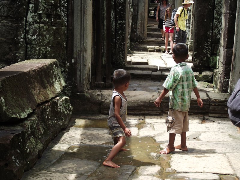 Kids playing at a temple
