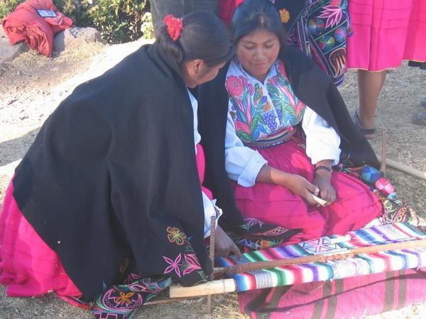 Local women weaving theirs own clothes