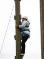 Emma climbing the pole