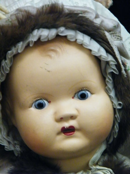 Creepy doll from the museum of childhood