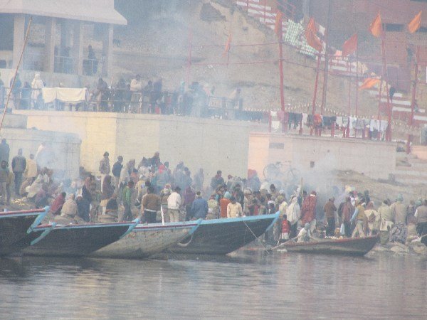 Crowds near the burning ghat