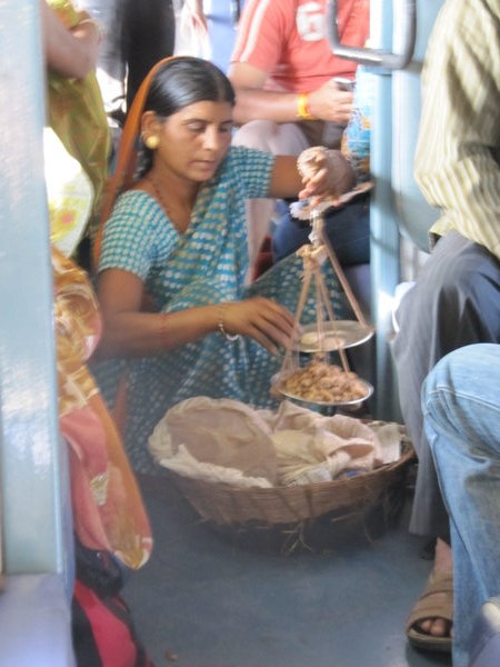 Peanut vendor on train