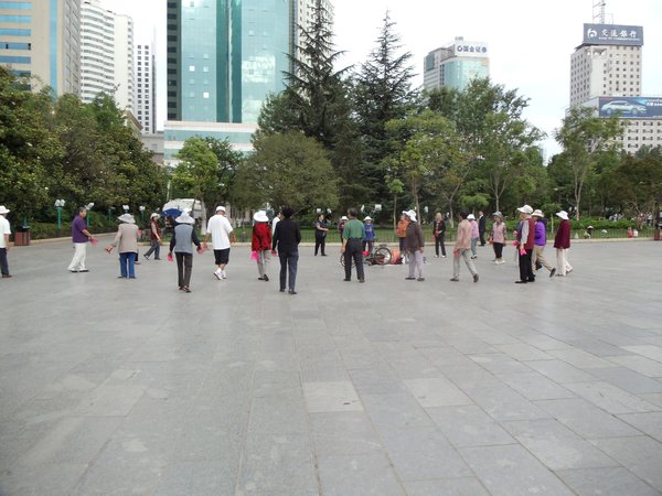 Big Circle of Dancing Elderly People