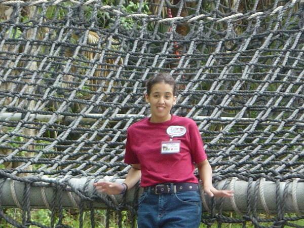 Tianna in front of the obstacle course