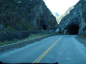 Train and vehicle tunnel into Thermopolis