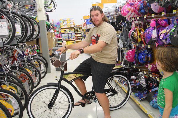 Stu "trying out" the bikes in Walmart